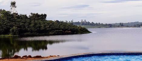 Outdoor pool, an infinity pool, sun loungers