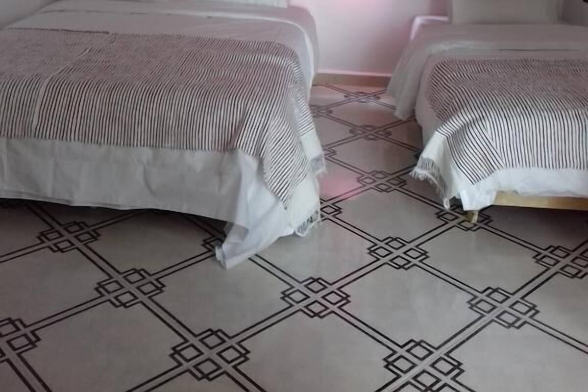 Basic Triple Room, Multiple Beds, Non Smoking | Free WiFi, bed sheets