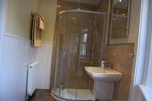 Shower, free toiletries, hair dryer, towels