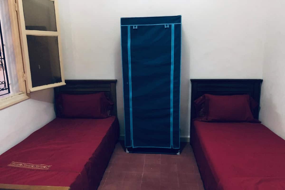 Desk, blackout curtains, free WiFi, bed sheets