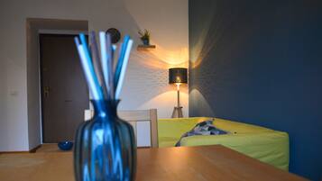 Suite Deluxe, 1 grand lit et 1 canapé-lit | Coin séjour | Télévision à écran plat