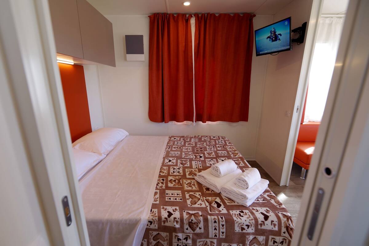 Mobile Home Deluxe, 1 très grand lit