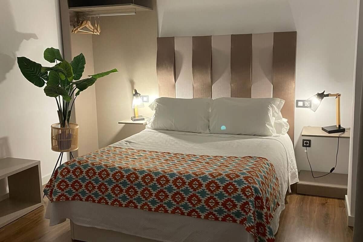 Aparta-suite El Arco | 1 habitación, minibar, insonorización y cunas