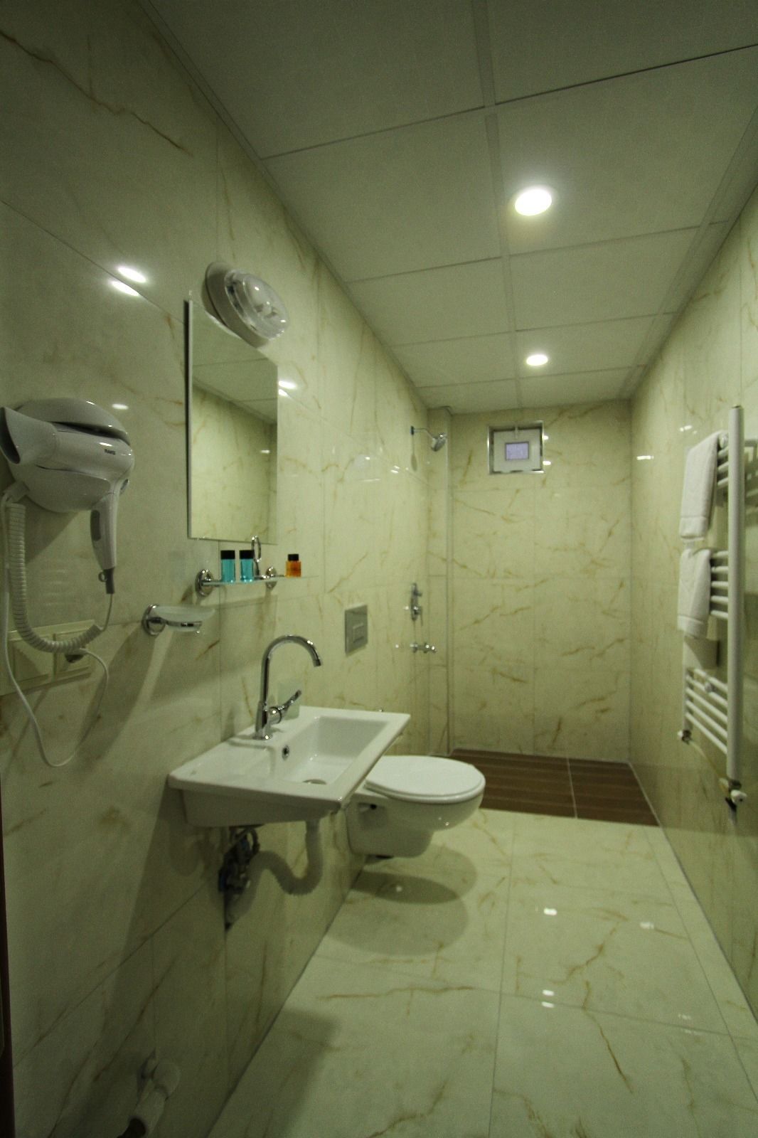 shower, free toiletries, hair dryer, slippers