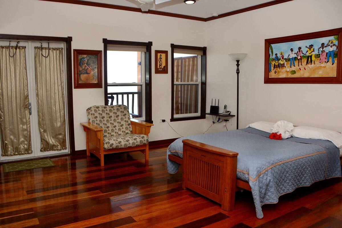 deluxe suite, 1 bedroom (namaste) | living area | 40-inch smart tv with cable channels, tv, dvd player