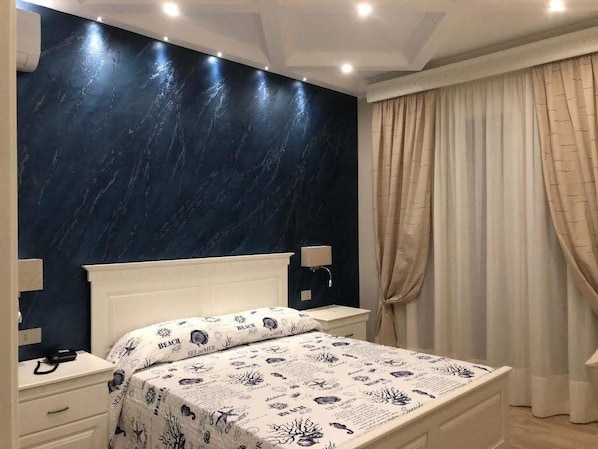 Luxury Double Room (Blu) | Minibar, free cribs/infant beds, free WiFi