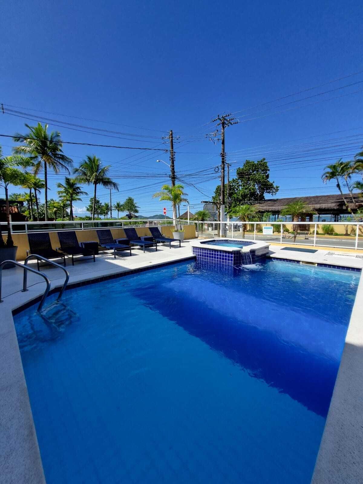 2 outdoor pools, pool umbrellas, sun loungers