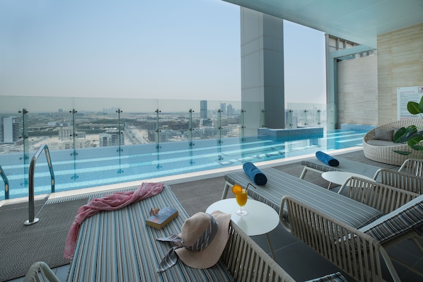 Outdoor pool, sun loungers