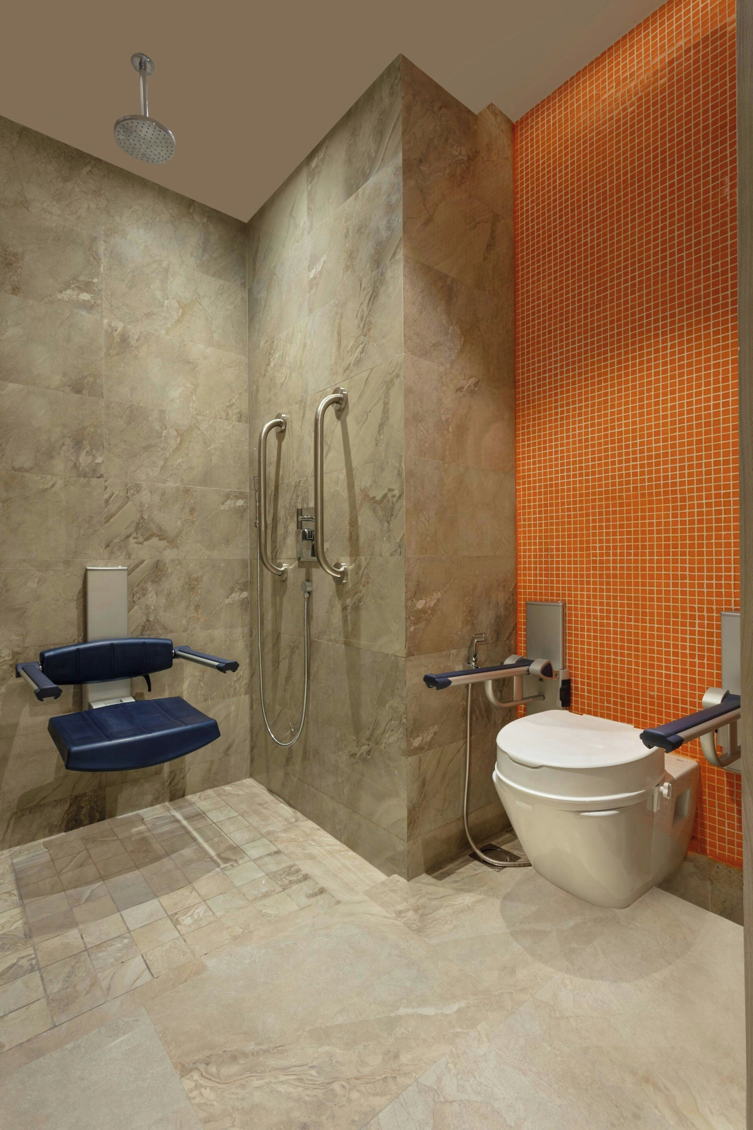 room, 1 king bed | bathroom | shower, rainfall showerhead, free toiletries, hair dryer