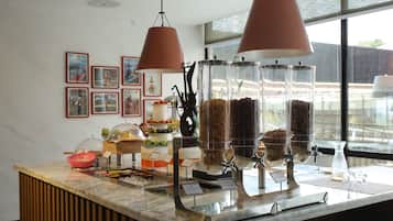 Daily buffet breakfast (USD 15 per person)