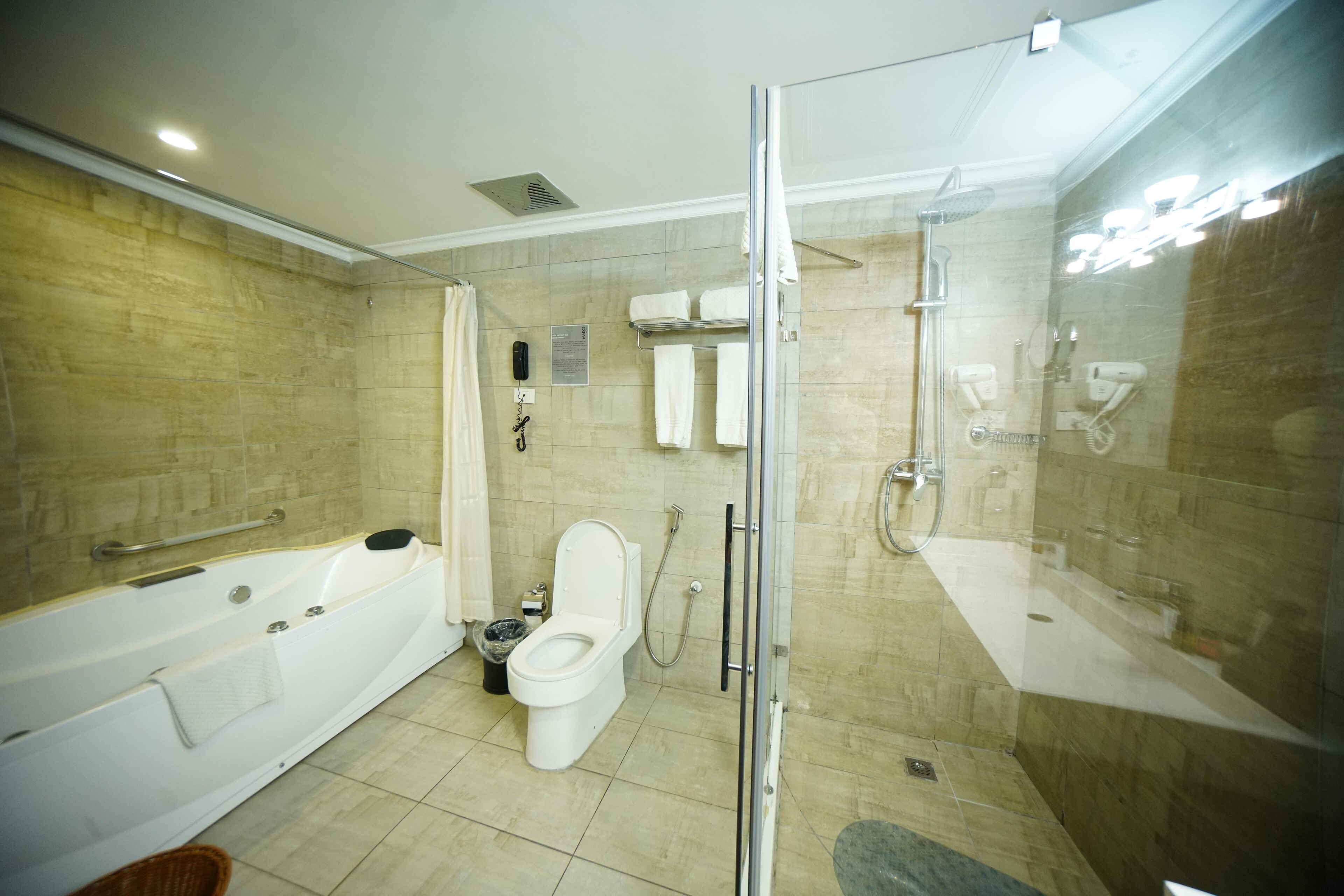 mado suite | bathroom | free toiletries, hair dryer, slippers, towels