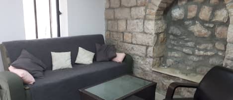 Classic Apartment | Living area | Flat-screen TV