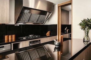 Villa (One) | Private kitchen | Espresso maker, coffee/tea maker, electric kettle, dining tables