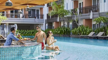 Outdoor pool, pool umbrellas, sun loungers