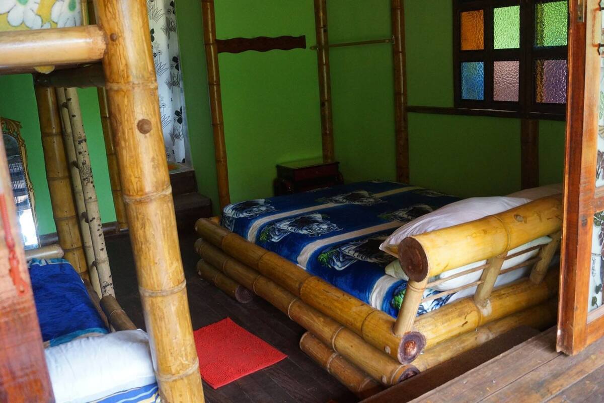 Habitación cuádruple familiar | Ropa de cama 