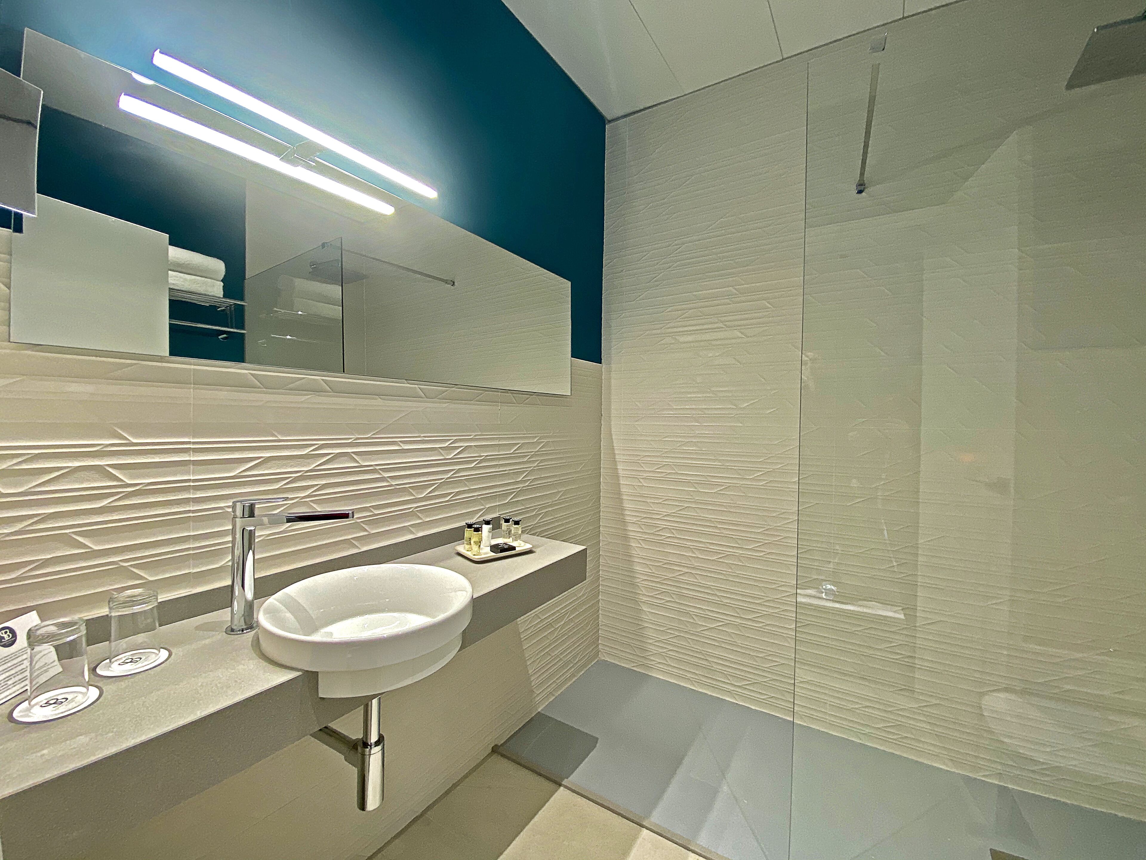 bathroom | free toiletries, hair dryer, towels, soap