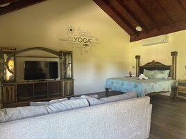 Premium Studio Suite, 1 King Bed, Hot Tub, Ground Floor | Individually decorated, individually furnished, iron/ironing board