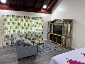 Premium Studio Suite, 1 King Bed, Hot Tub, Ground Floor | Living area - Yoga Dreams Negril (Negril)