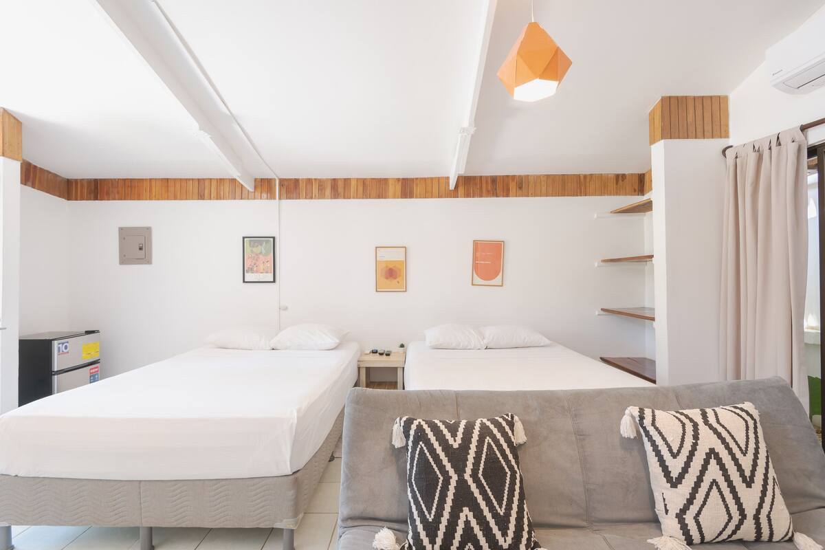 Premium bedding, memory foam beds, in-room safe, laptop workspace