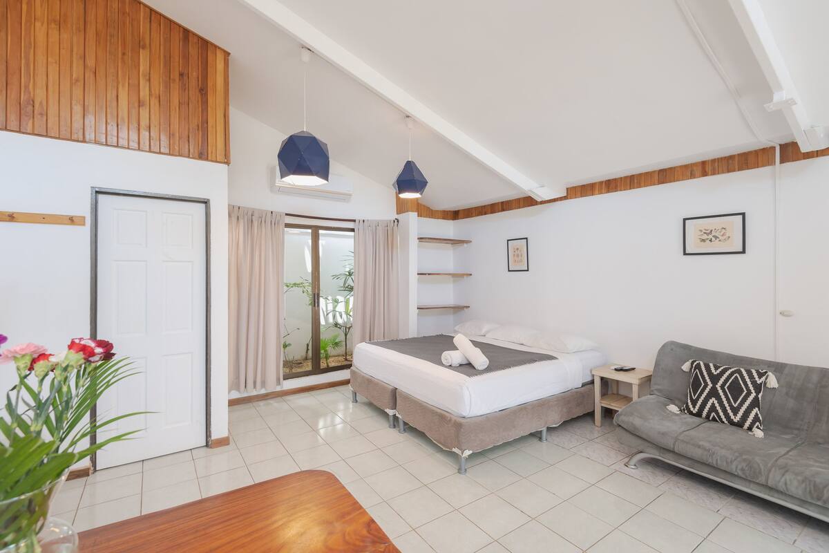 Premium bedding, memory foam beds, in-room safe, laptop workspace
