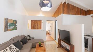 Deluxe Apartment | Living area | 43-inch Smart TV with cable channels, TV, Netflix