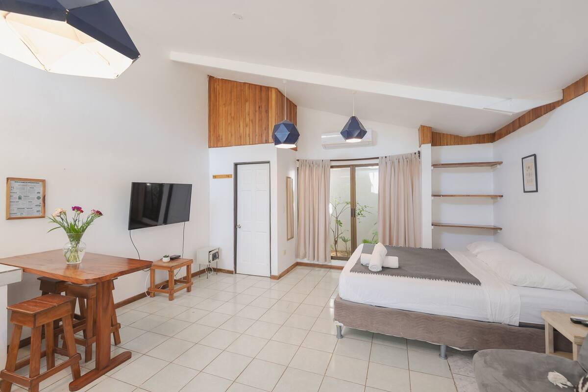 Premium bedding, memory foam beds, in-room safe, laptop workspace