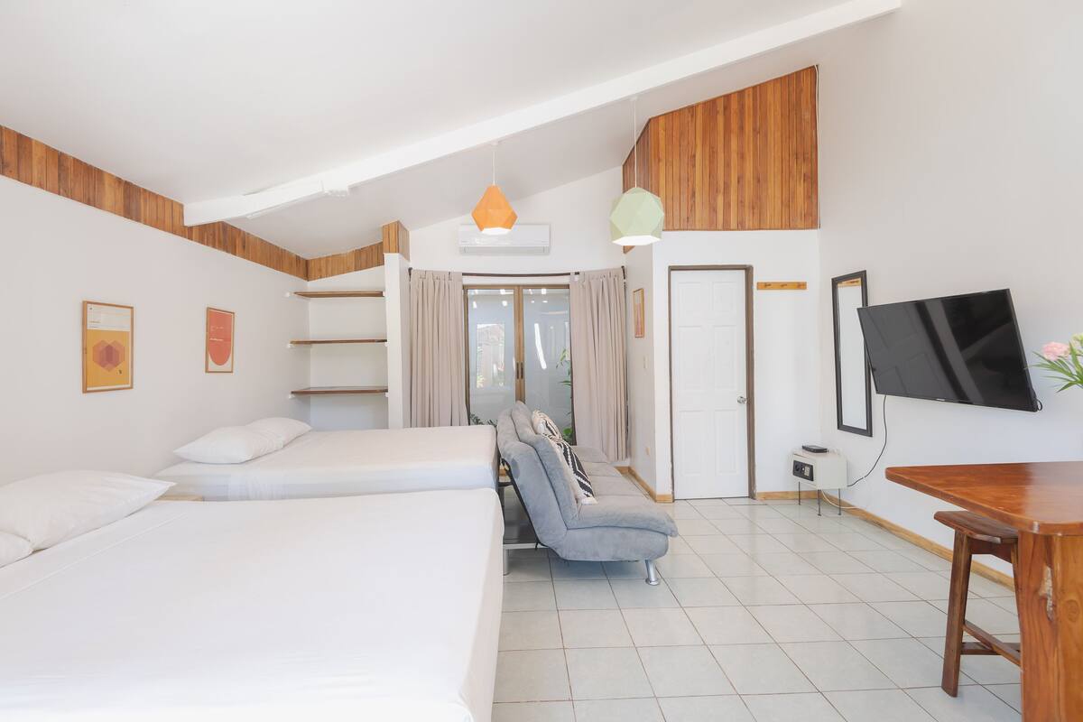 Premium bedding, memory foam beds, in-room safe, laptop workspace