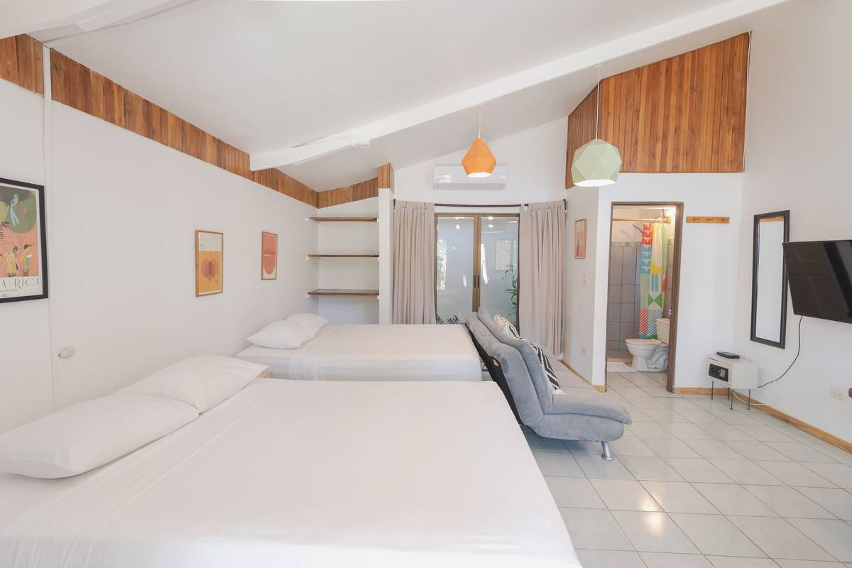 Premium bedding, memory foam beds, in-room safe, laptop workspace