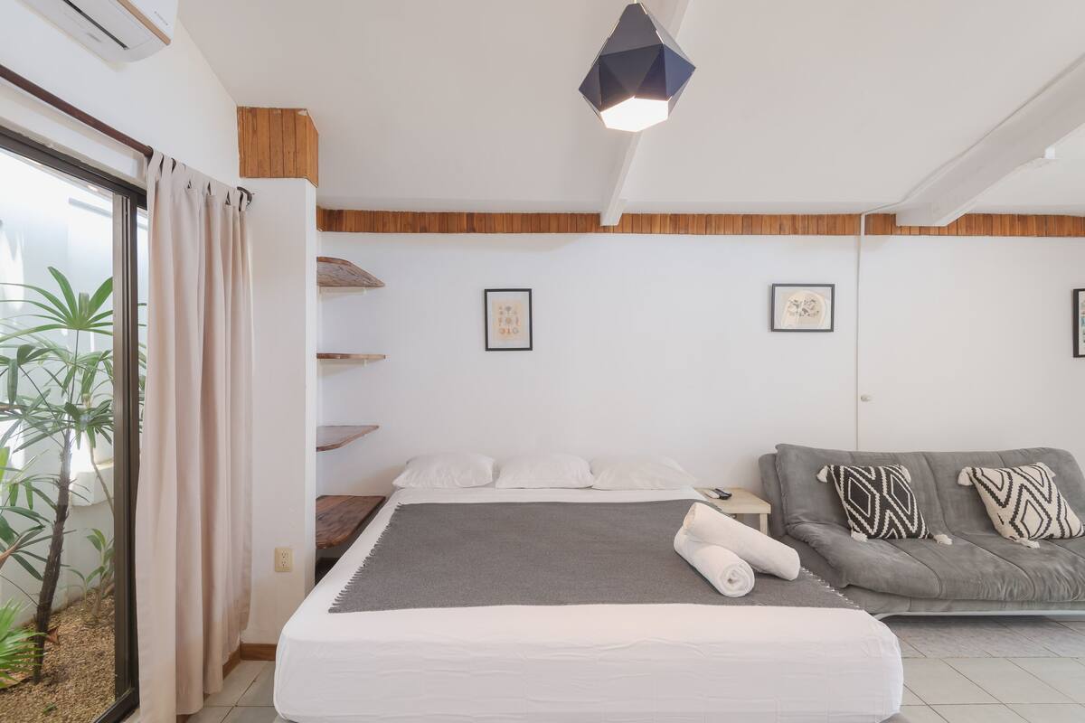 Premium bedding, memory foam beds, in-room safe, laptop workspace