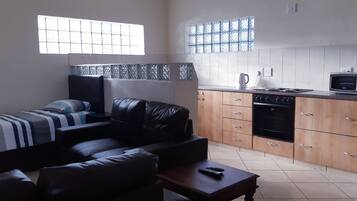 Standard Apartment, 1 Bedroom | Private kitchen | Full-sized fridge, microwave, oven, stovetop