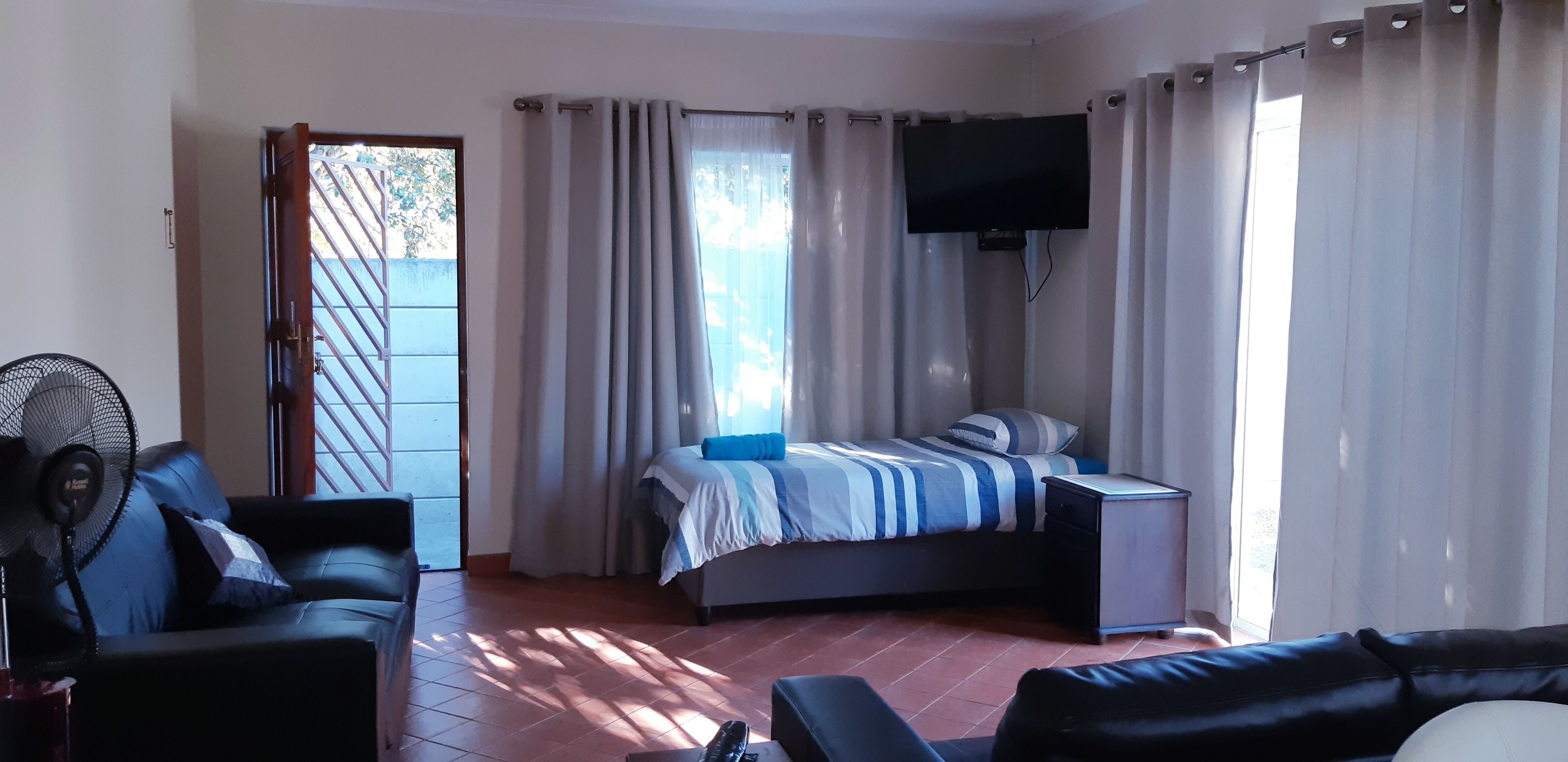 スタンダード アパートメント 2 ベッドルーム | リビングルーム | 薄型テレビ