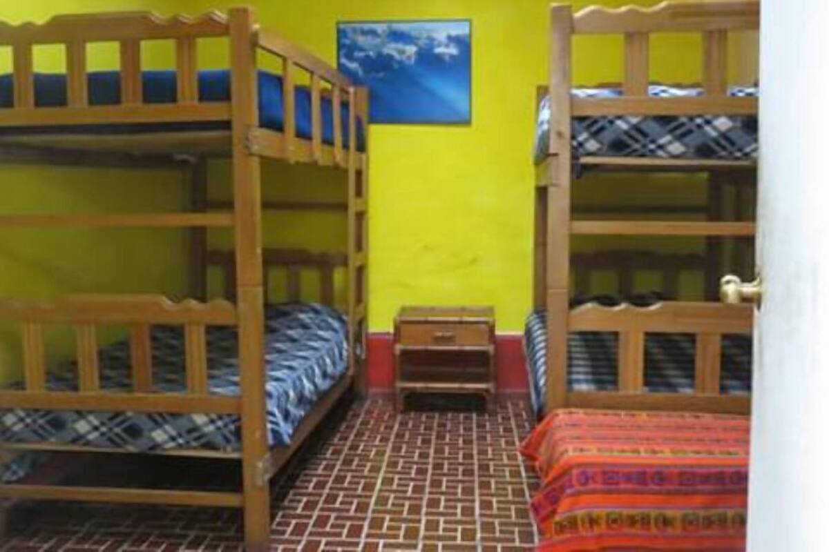 Shared Dormitory (External shared bathroom, 4 beds) | Blackout curtains, bed sheets