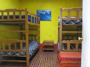 Shared Dormitory (External shared bathroom, 4 beds) | Blackout curtains, bed sheets