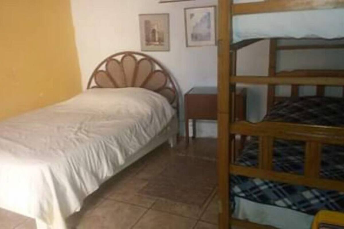 Triple Room (external shared bathroom) | Blackout curtains, bed sheets