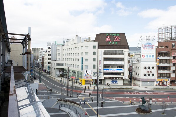 Explore the vibrant city streets, lined with shops and businesses, and discover the local culture.