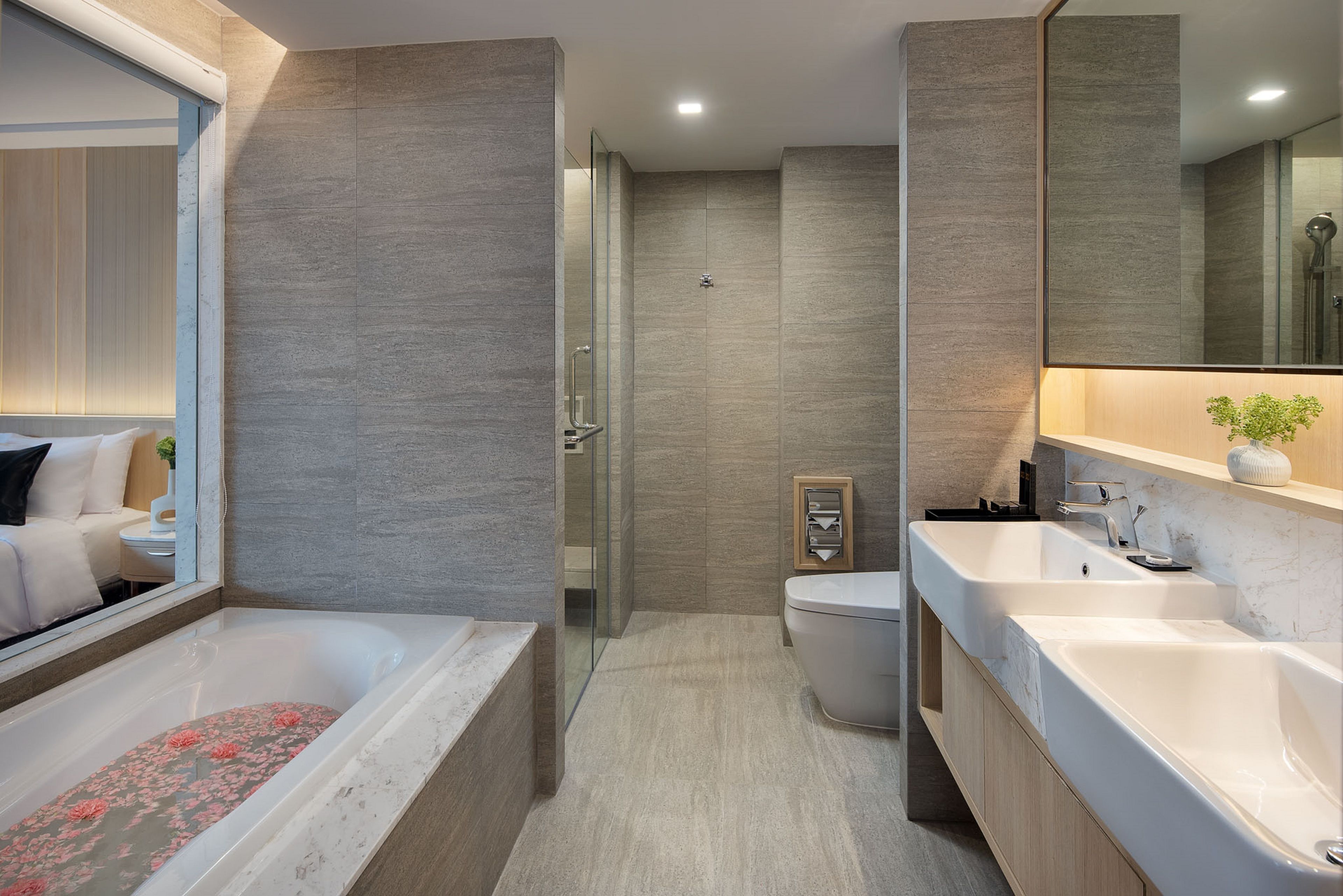 executive room | bathroom | designer toiletries, hair dryer, bathrobes, slippers