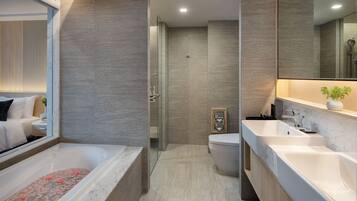 Executive Room | Bathroom | Designer toiletries, hair dryer, bathrobes, slippers