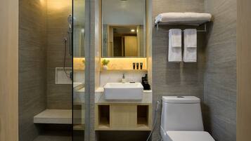 Designer toiletries, hair dryer, bathrobes, slippers