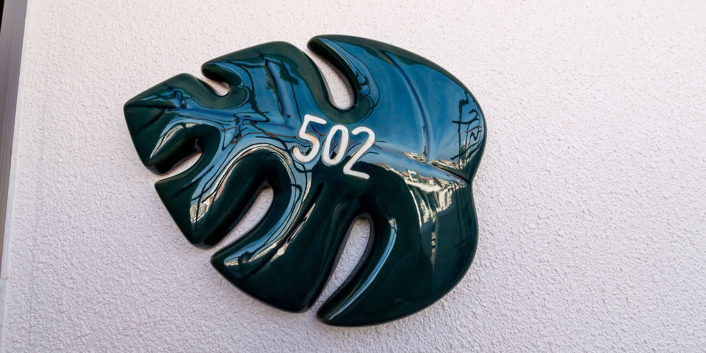 A green helmet with the number 502 on it.
