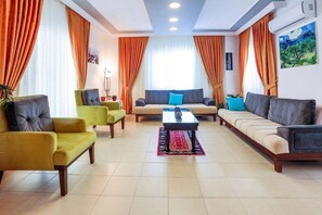 Villa | Coin séjour | Télévision