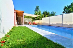Outdoor pool, pool umbrellas, pool loungers