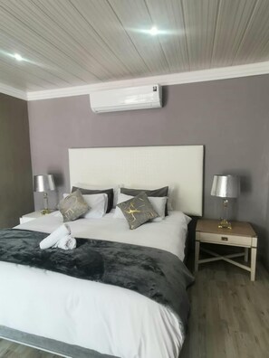Premium bedding, individually decorated, individually furnished - Botle Ba Afrika Lodge (Vereeniging)