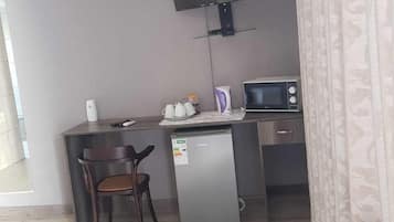 Executive-Zimmer, 1 King-Bett | Hochwertige Bettwaren, individuell dekoriert, individuell eingerichtet
