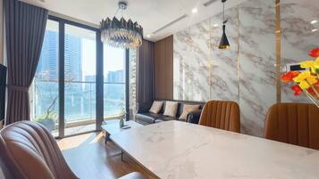 Luxury Apartment, 2 Bedrooms, City View, Tower | Living area | 55-inch Smart TV with digital channels, TV