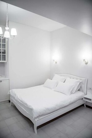 Habitación Deluxe doble | Caja fuerte, sistema de insonorización, tabla de planchar con plancha