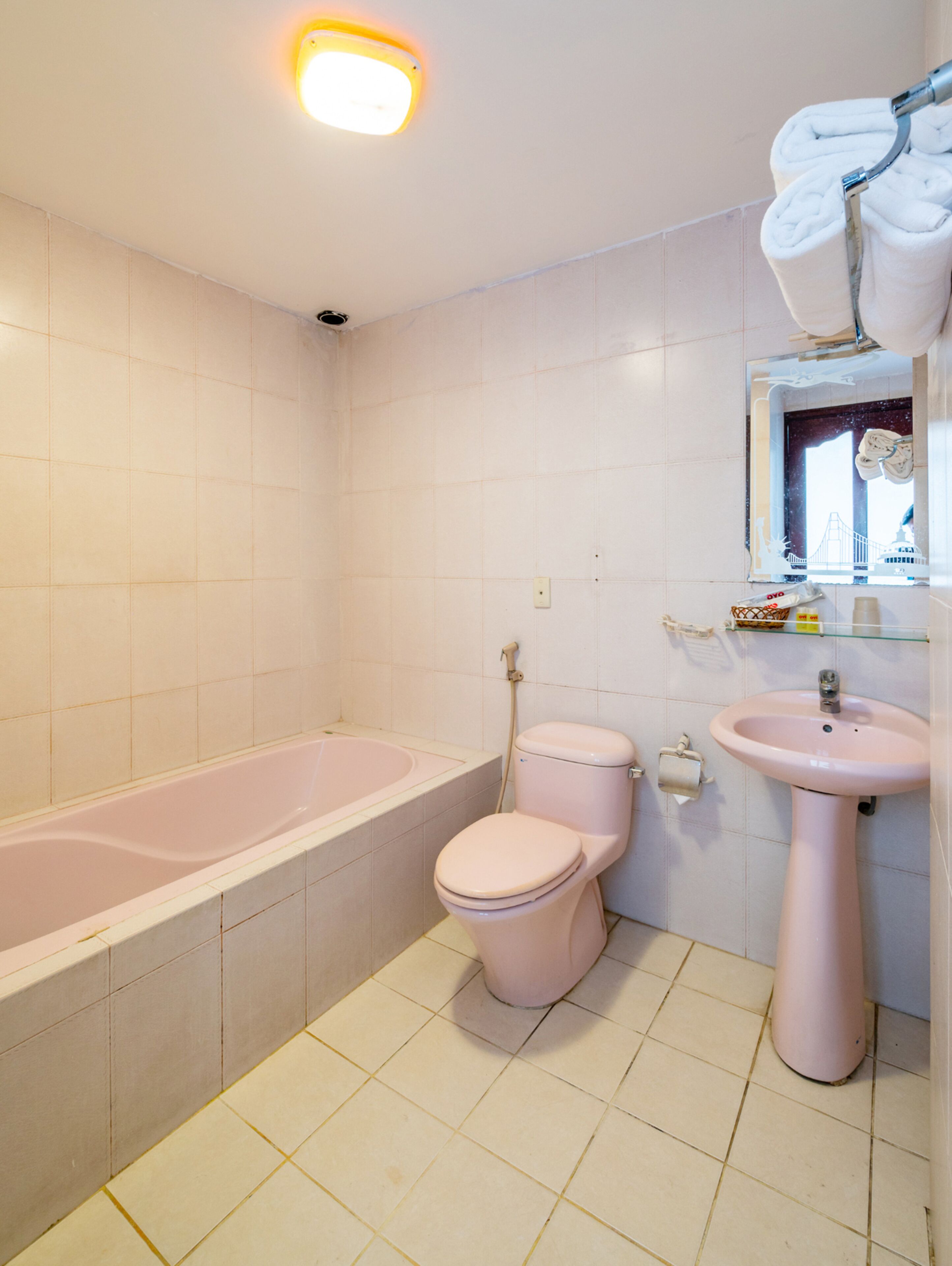 family suite | bathroom | shower, slippers, bidet, towels