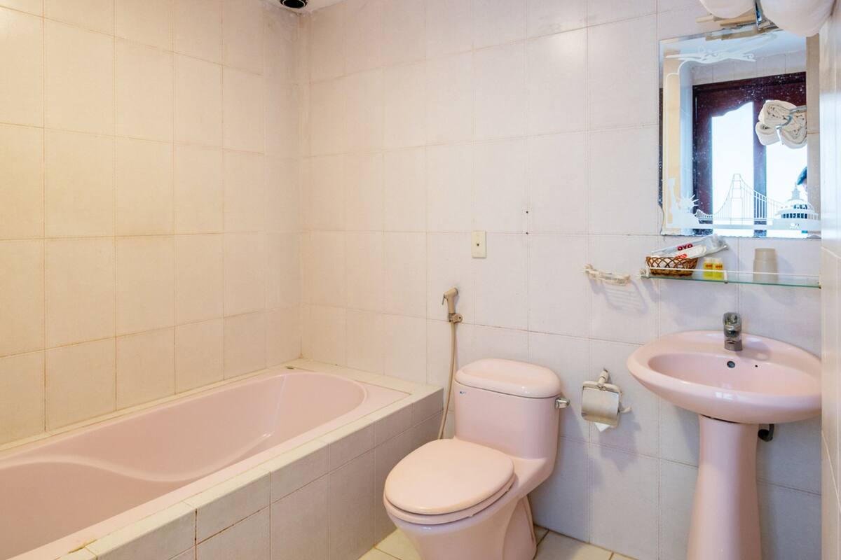family suite | bathroom | shower, slippers, bidet, towels