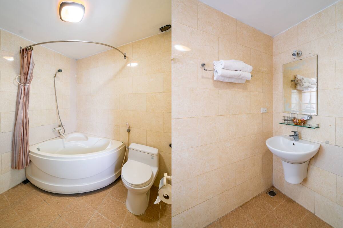 shower, slippers, bidet, towels