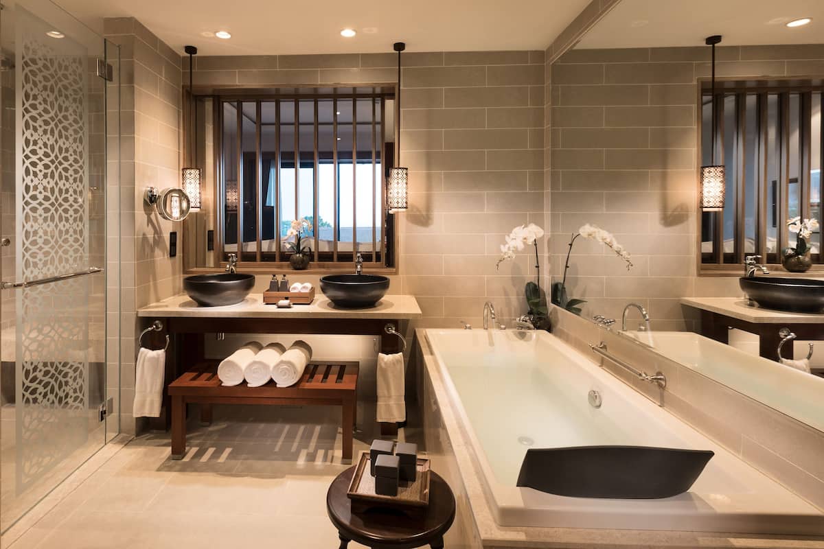 deep-soaking bathtub, rainfall showerhead, free toiletries, hair dryer