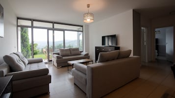 Apartment (B3) | Living area | Flat-screen TV